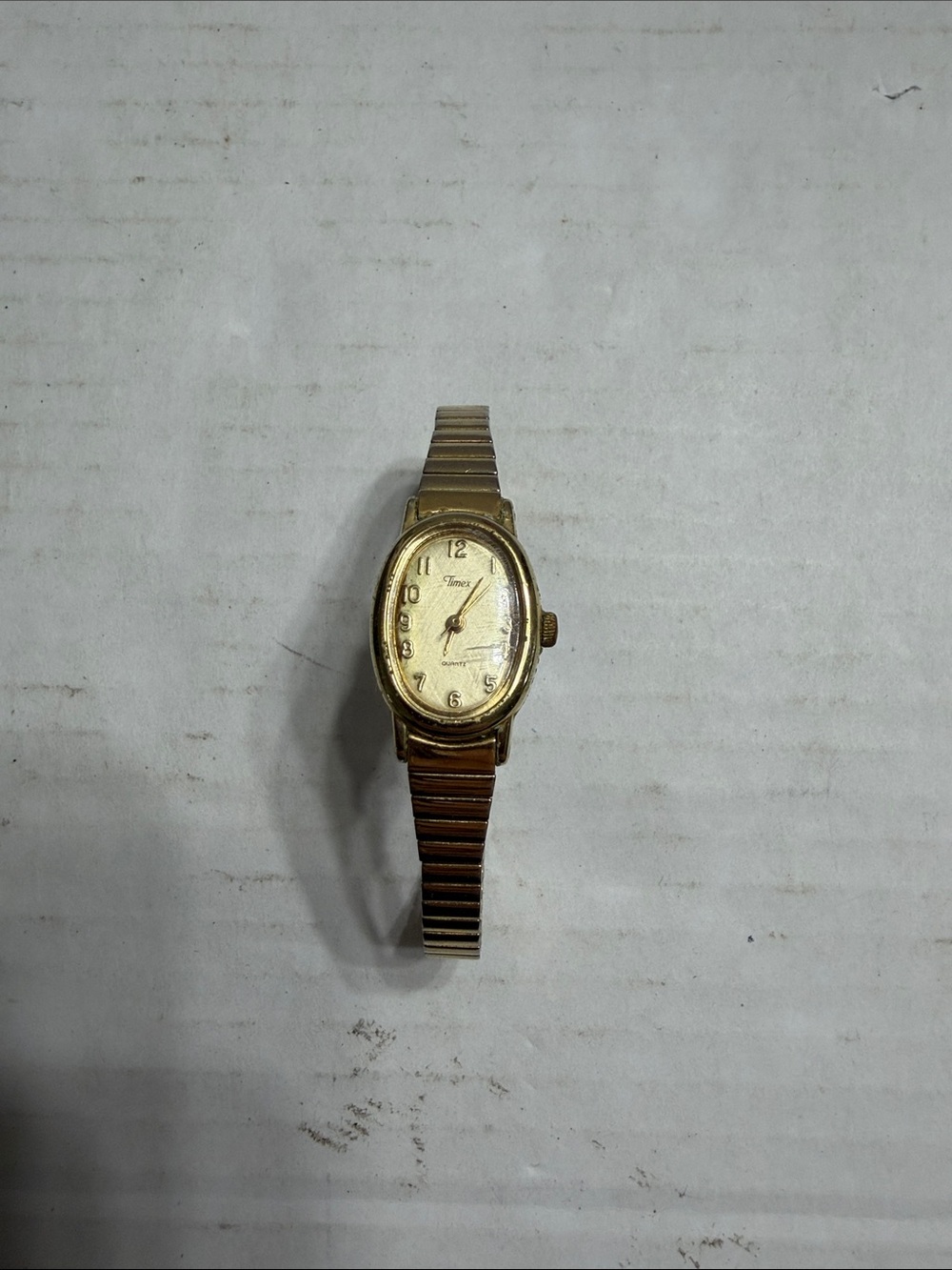 Vintage Timex Gold Tone Oval Women's Watch with Stretch Band